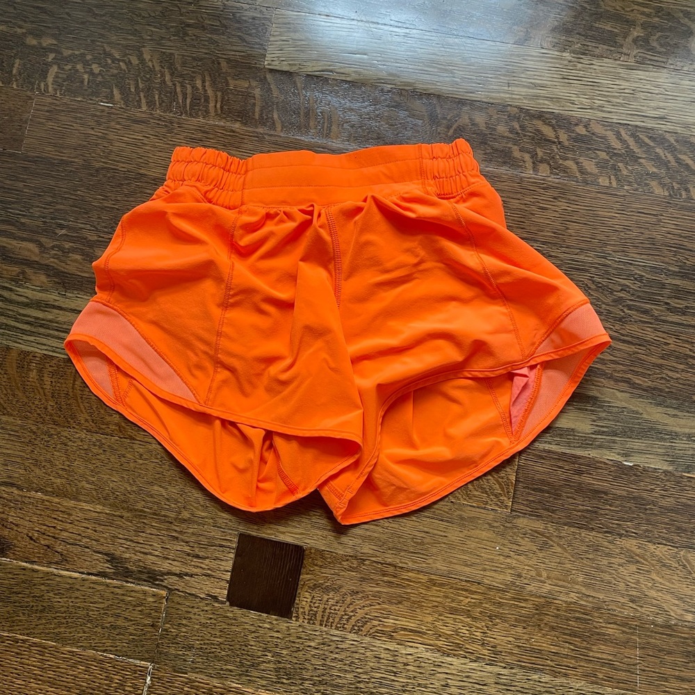 orange lululemon hotty hot shorts 4 inch size 4